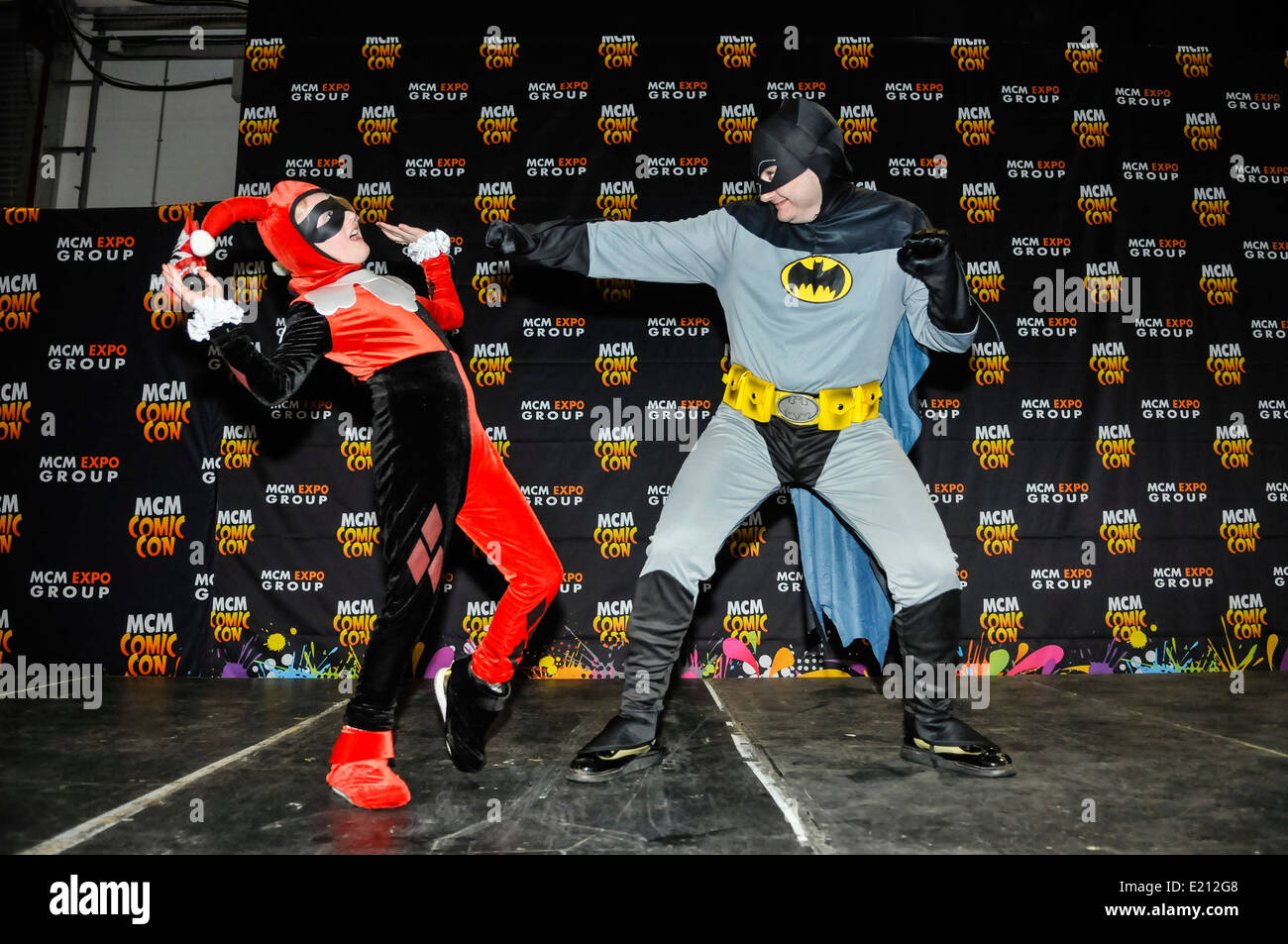 Batman and Harley Quinn during Cosplay at Comicon Stock Photo