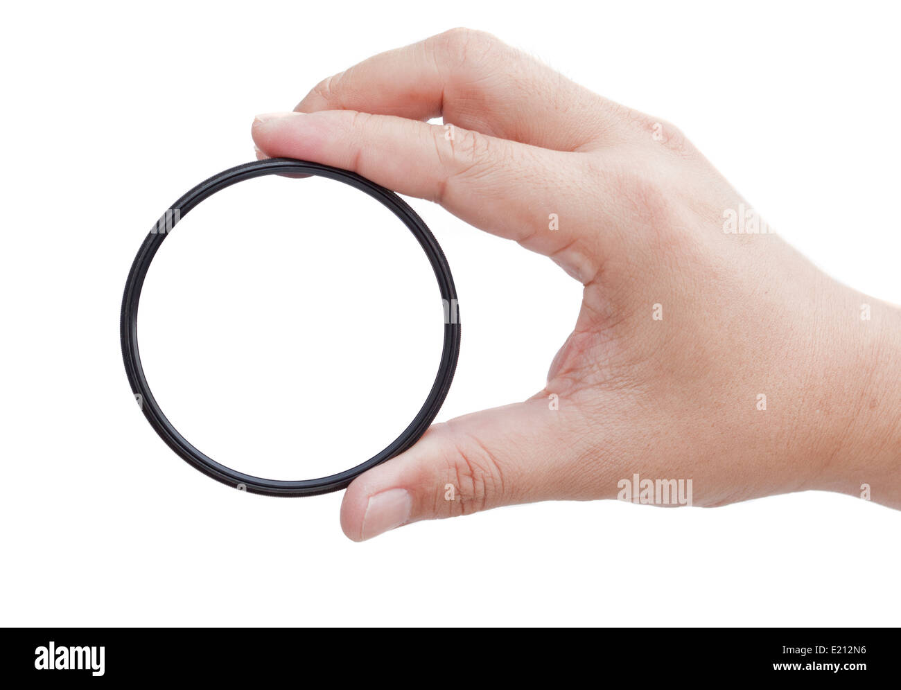 Hand holding clear camera filter Stock Photo Alamy