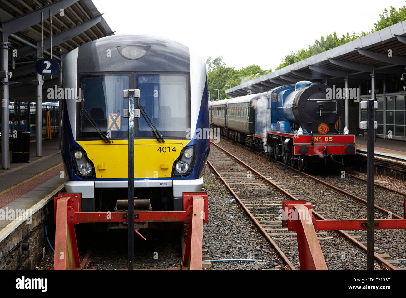 modern northern ireland railways class 4000 train and steam locomotive train at bangor station northern ireland Stock Photo