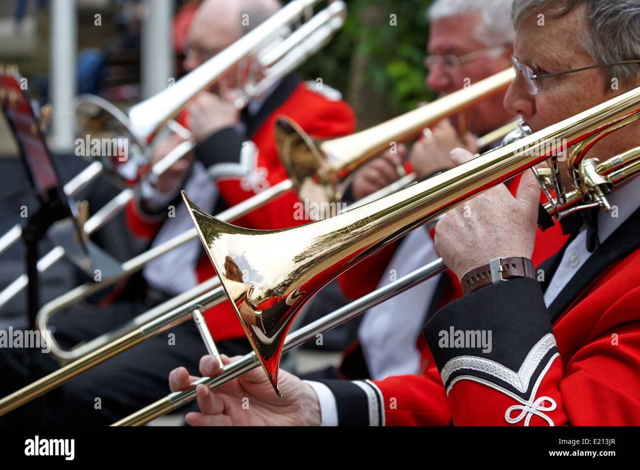 trombone players in the brass section of a band bangor northern ireland Stock Photo