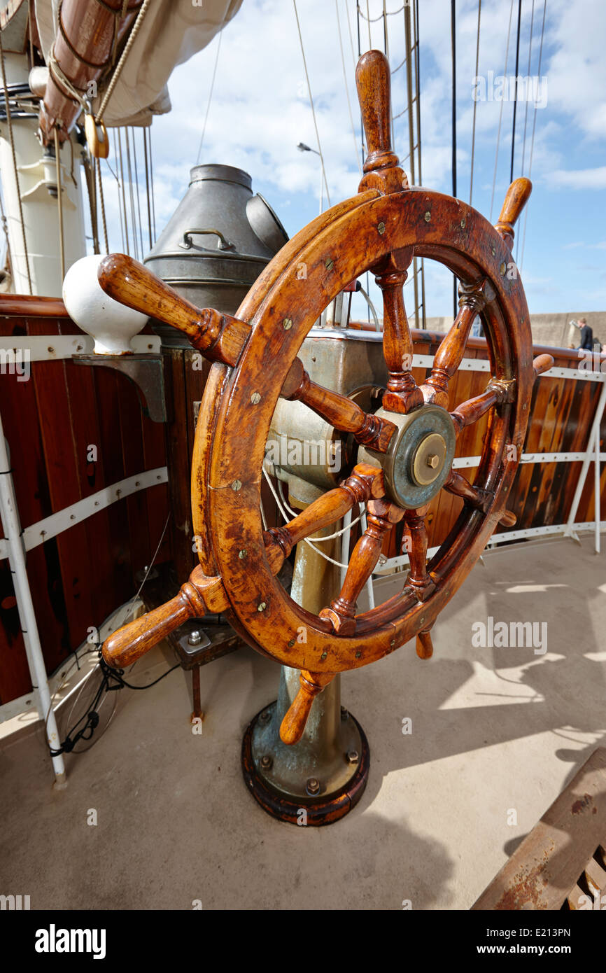 ships wheel on a sailing tall ship bangor northern ireland Stock Photo