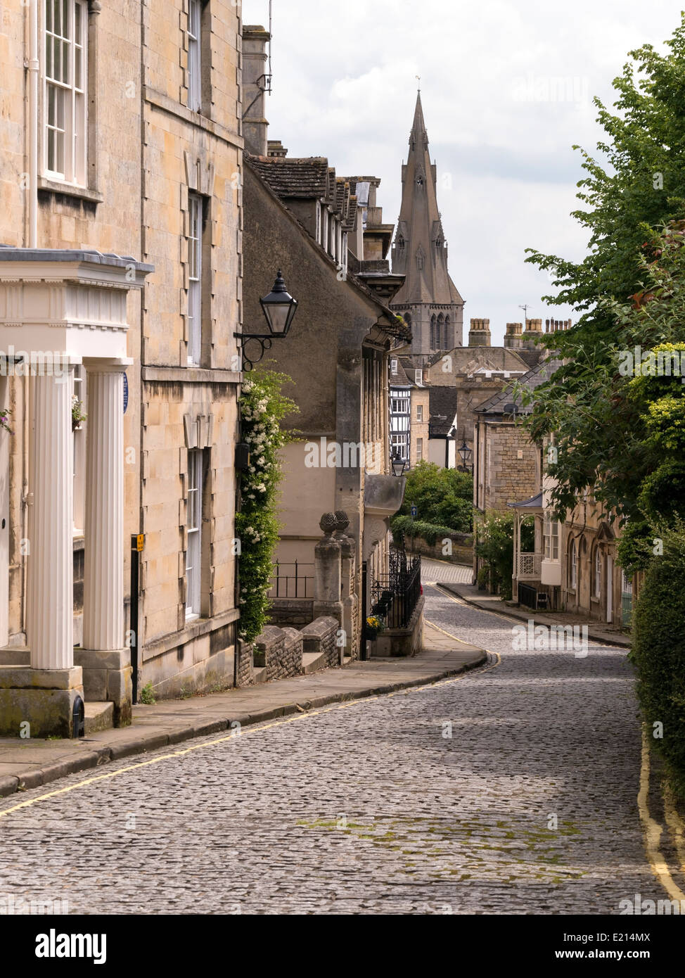 Old narrow cobbled street with stone houses, Barn Hill and All Saints Place, Stamford, Lincolnshire, England,UK Stock Photo