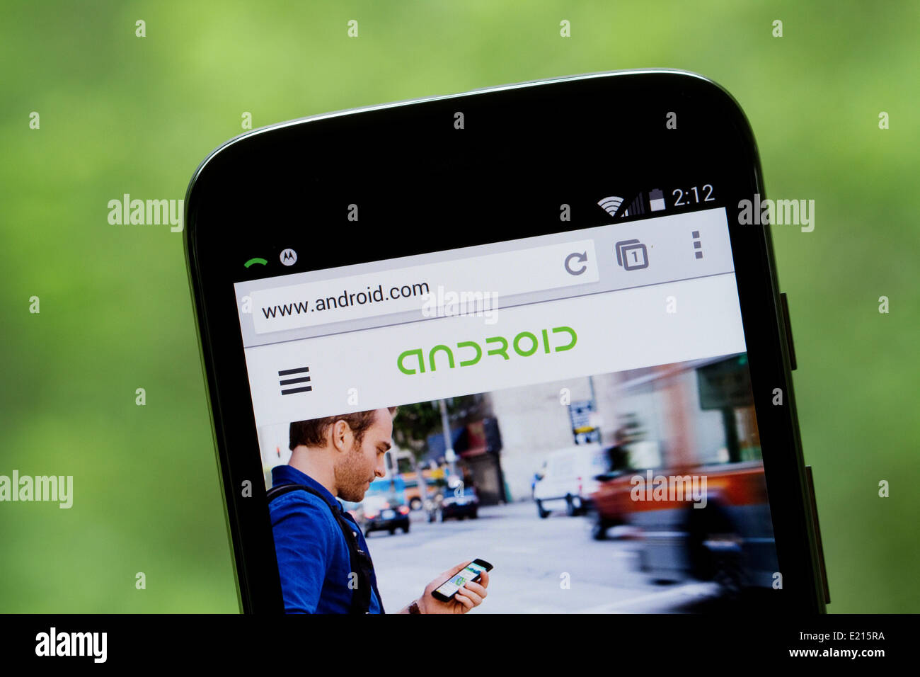 Android website displayed on the screen of a Motorola, Moto G cellphone, mobile phone. Stock Photo