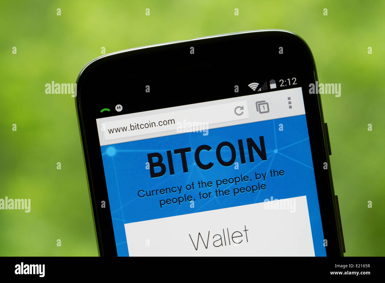 Bitcoin website displayed on the screen of a Motorola, Moto G cellphone, mobile phone. Stock Photo