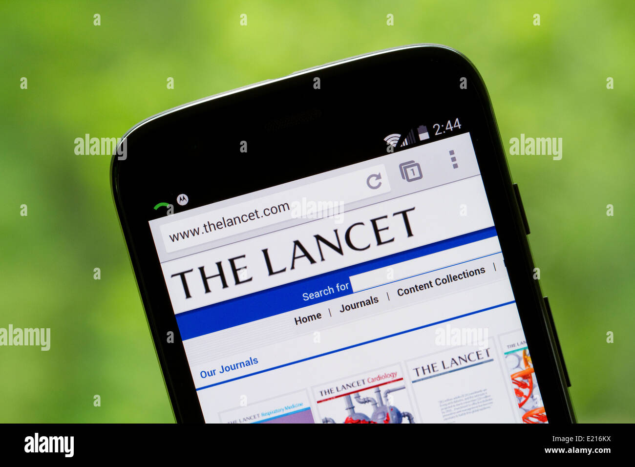 The Lancet website displayed on the screen of a Motorola, Moto G cellphone, mobile phone. Stock Photo