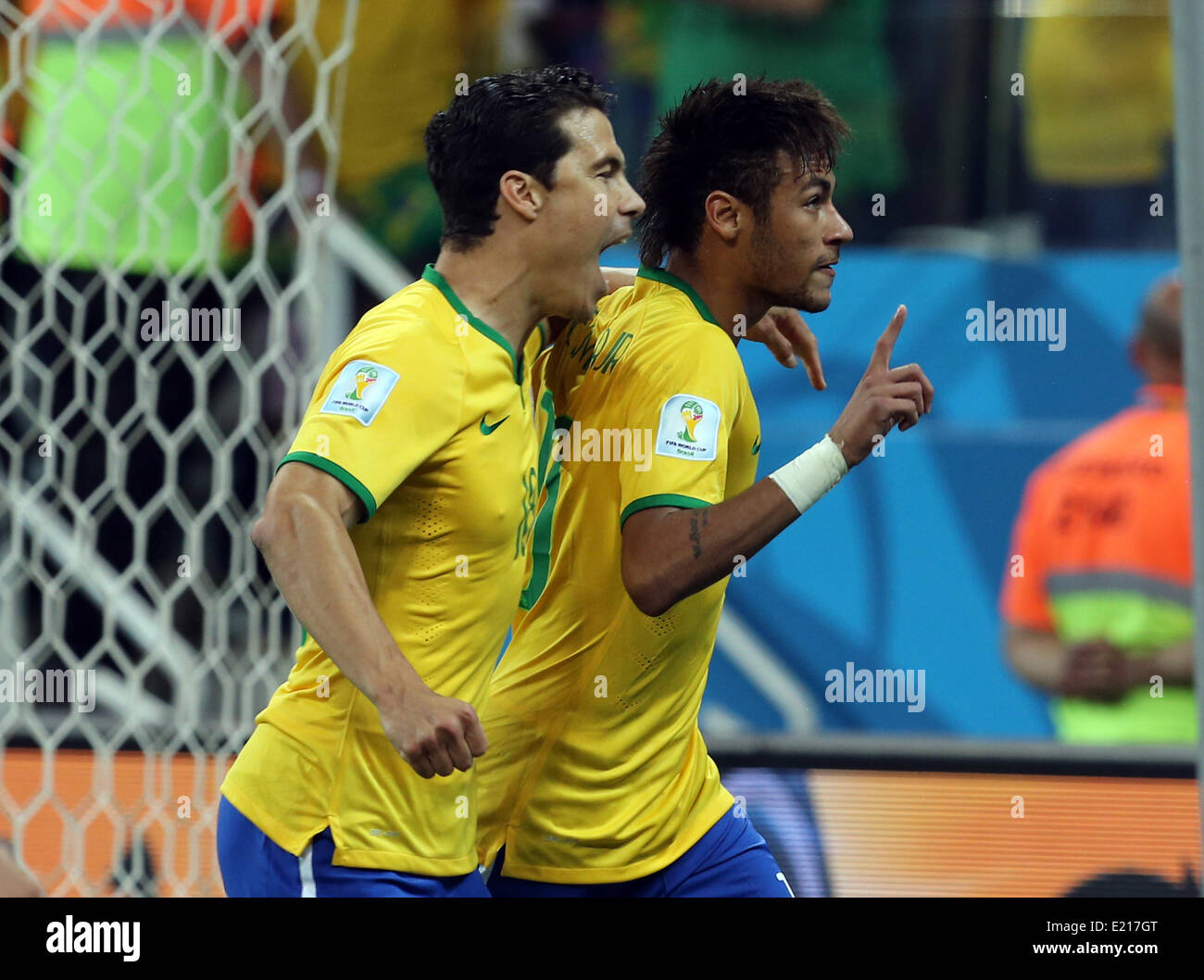 Sao Paulo, Brazil. 12th June, 2014. World Cup finals 2014. Opening game, Brazil versus Croatia. Neymar celebrates after his second goal from the penalty spot with teammate Hernanes Credit:  Action Plus Sports/Alamy Live News Stock Photo