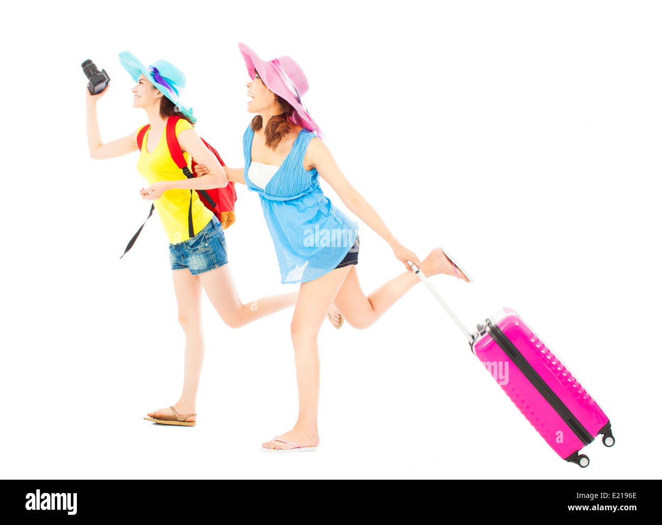 two female backpackers happy to travel worldwide Stock Photo