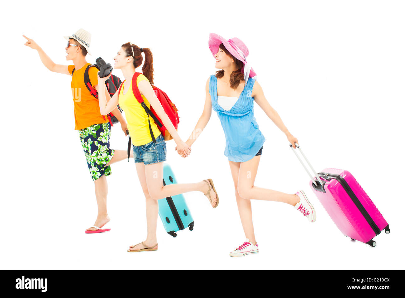 young friends happy to travel worldwide together Stock Photo