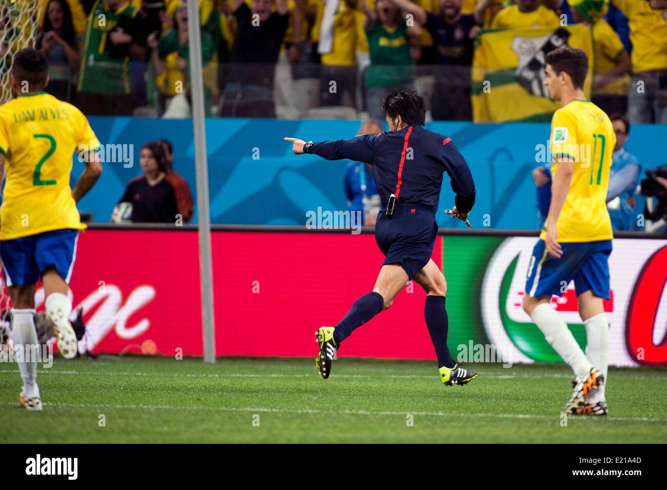 Sao Paulo, Brazil. 12th June, 2014. Yuichi Nishimura (Referee)  Japan's referee Yuichi Nishimura points at the penalty spot after Brazil's Fred was fouled inside the area during the FIFA World Cup Brazil 2014 Group A match between Brazil 3-1 Croatia at Arena de Sao Paulo in Sao Paulo, Brazil . Credit:  Maurizio Borsari/AFLO/Alamy Live News Stock Photo