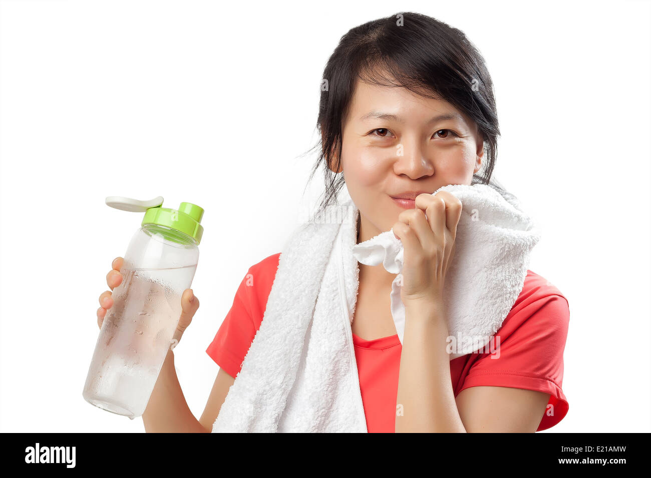 Woman drinking water after exercise on white background Stock Photo Alamy