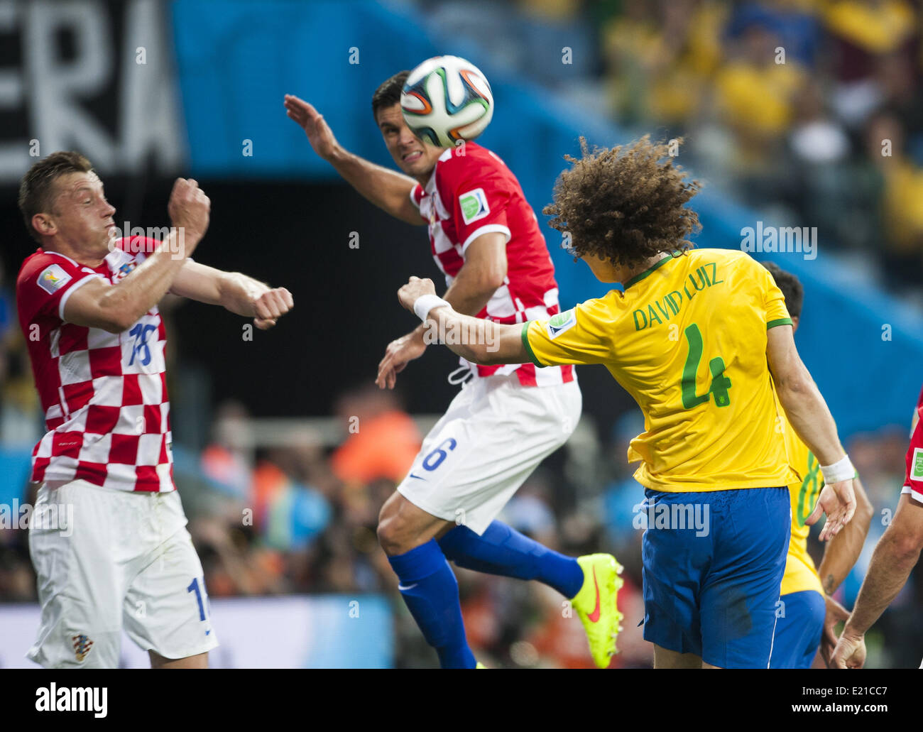 Sao Paulo, Brazil. 12th June, 2014.  Olic, David Luiz and Lovren in the match between Brazil and Croatia in the group stage of the 2014 World Cup, for the group A match at the Arena stadium in Sao Paulo on June 12, 2014 Photo:. Urbanandsport/Nurphoto Credit:  Urbanandsport/NurPhoto/ZUMAPRESS.com/Alamy Live News Stock Photo