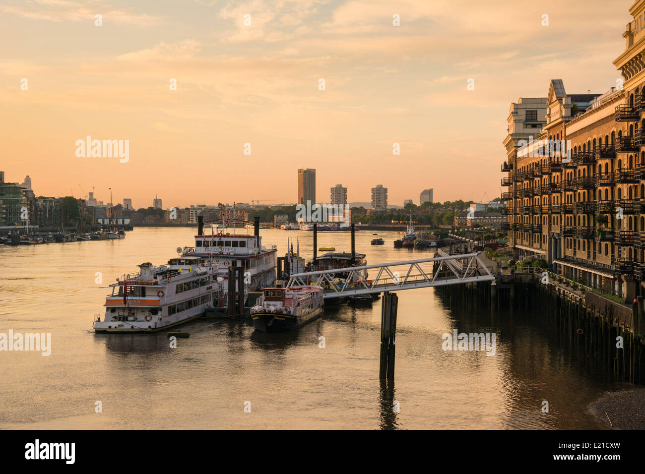 London, UK 13th June, 2014.  Butlers Wharf basks in dawn light as London wakes on a beautiful summer morning. Credit:  Patricia Phillips/Alamy Live News Stock Photo