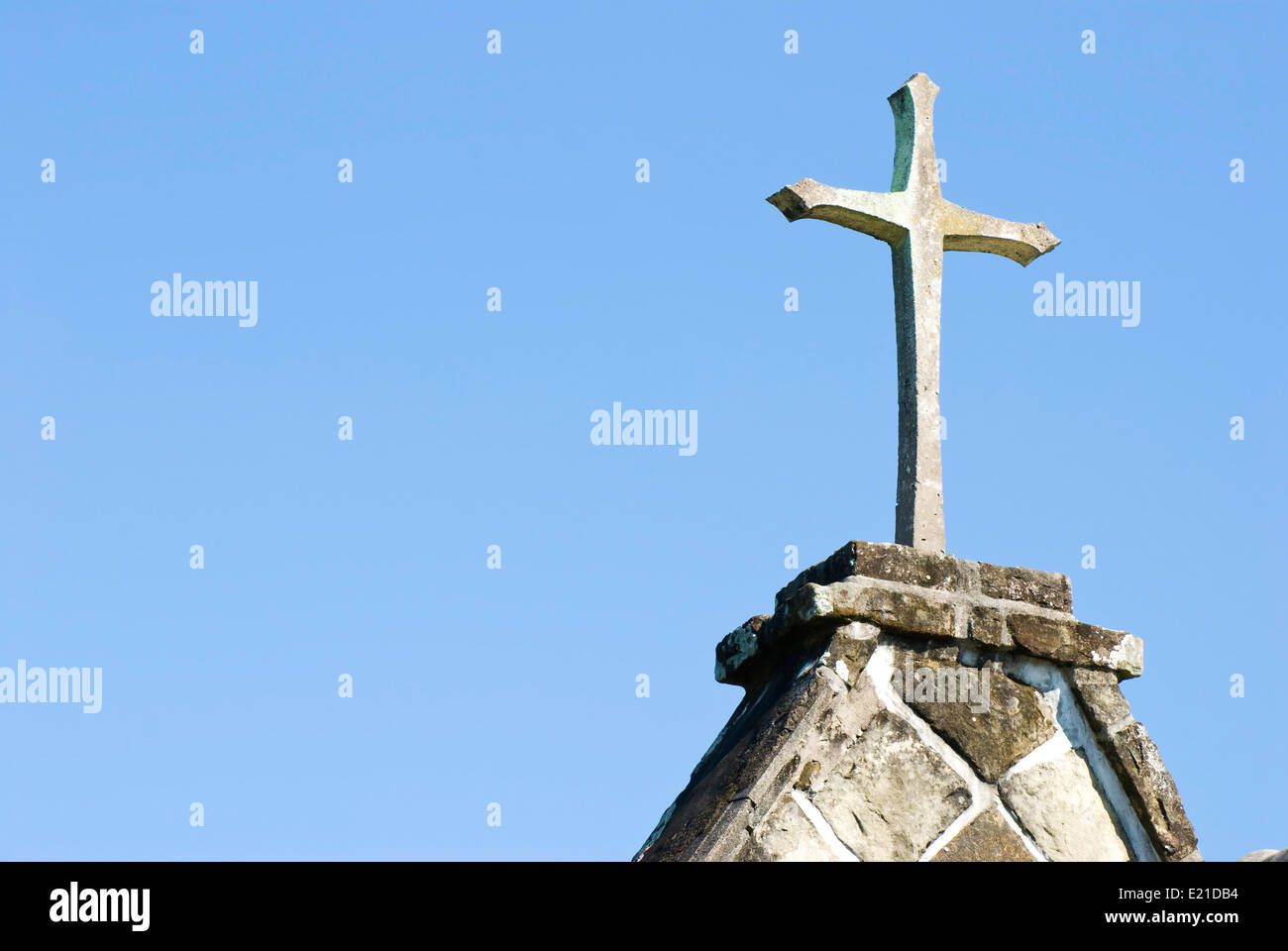 Cross on the top of old church Stock Photo