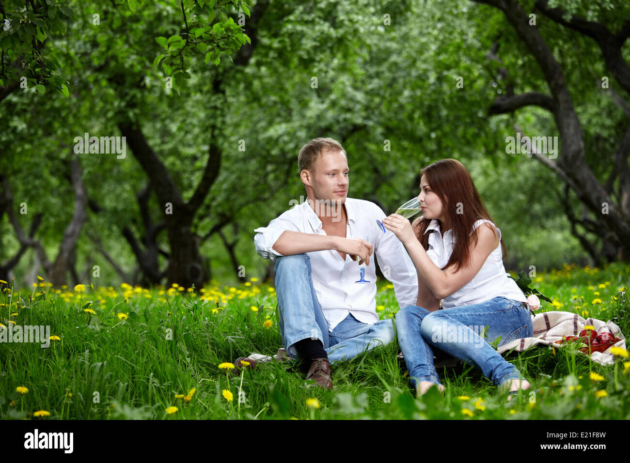 The young couple in park Stock Photo - Alamy