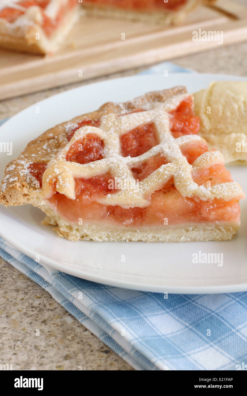 Strawberry and apple lattice pie with ice cream Stock Photo