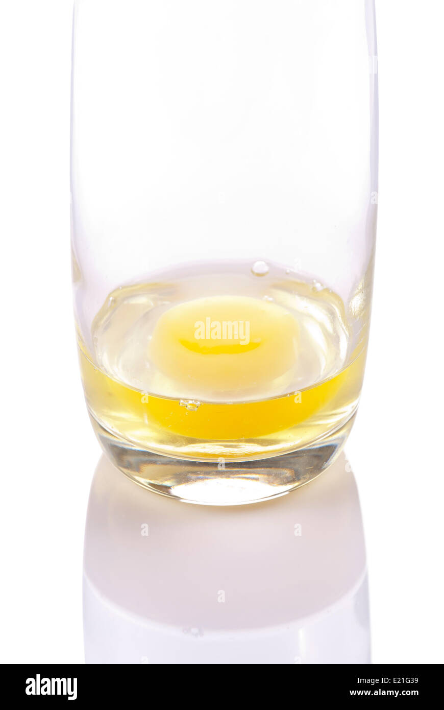 Cracked egg yolk glass hires stock photography and images Alamy