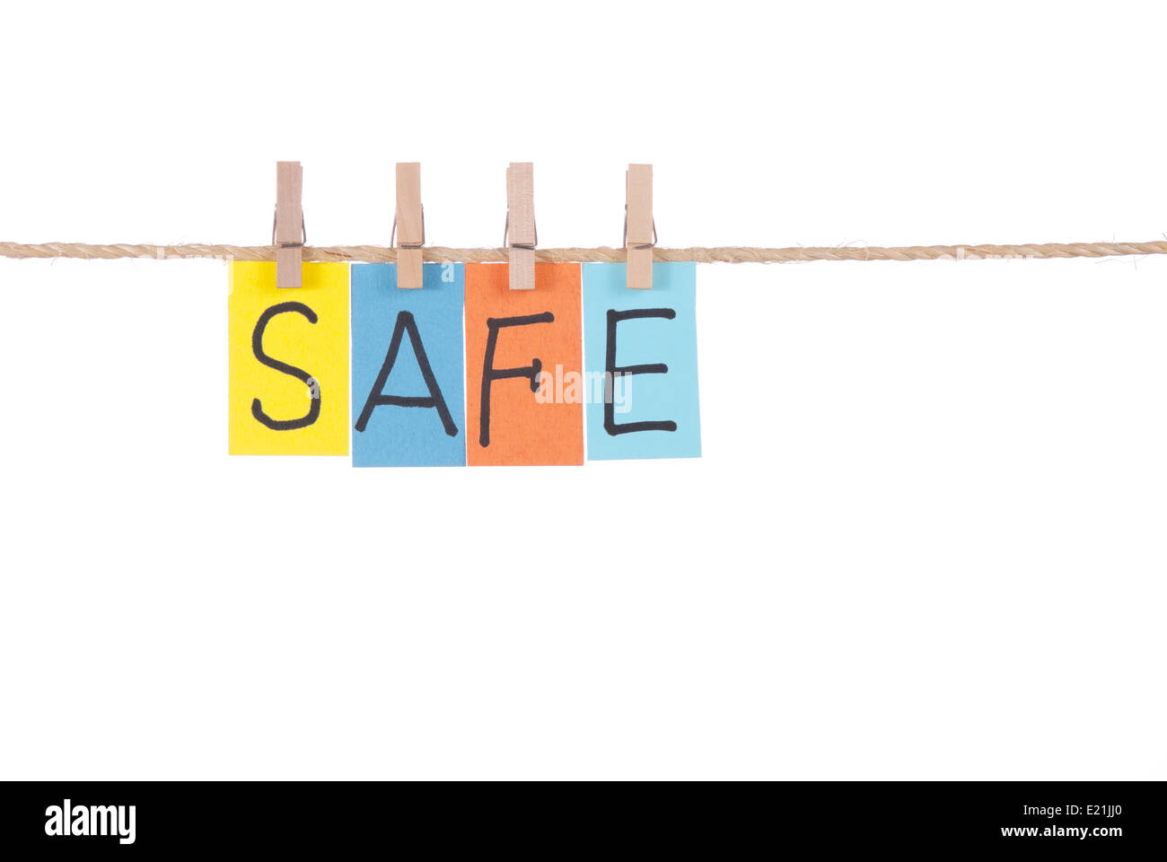 Safe, Wooden peg and colorful words Stock Photo Alamy