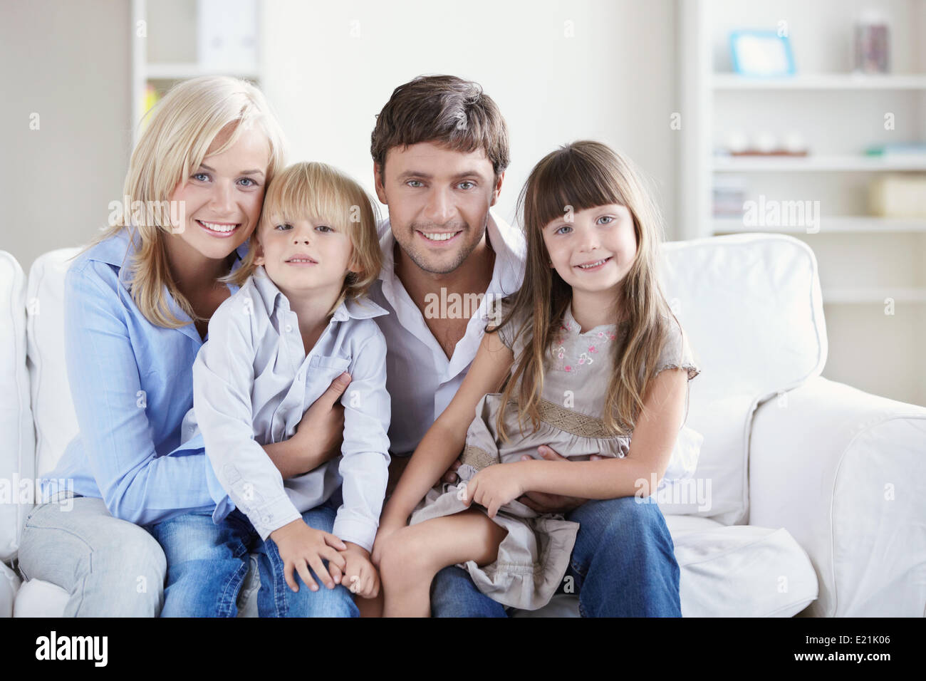 A happy family with two children Stock Photo - Alamy