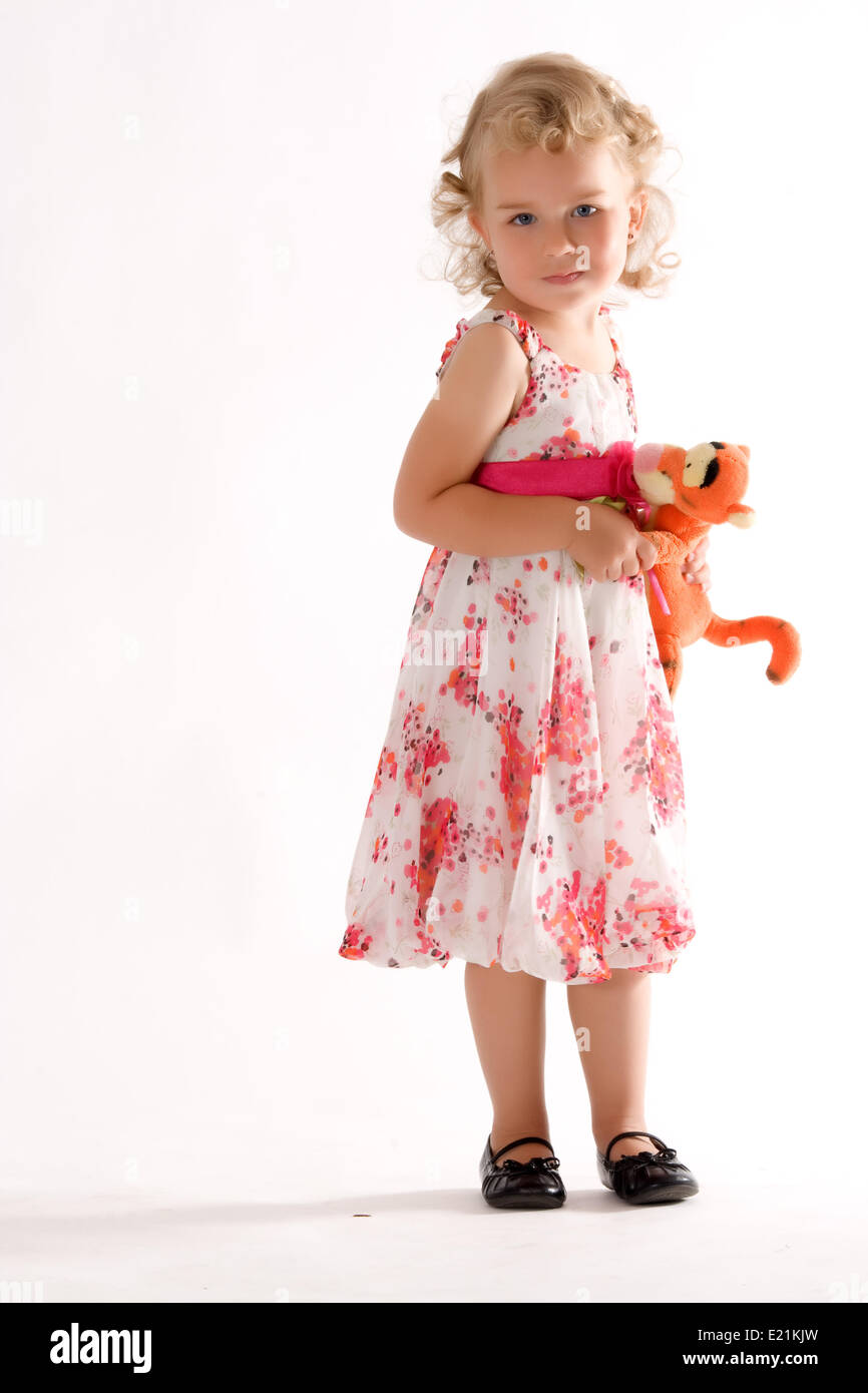 Small child with stuffed animal Stock Photo
