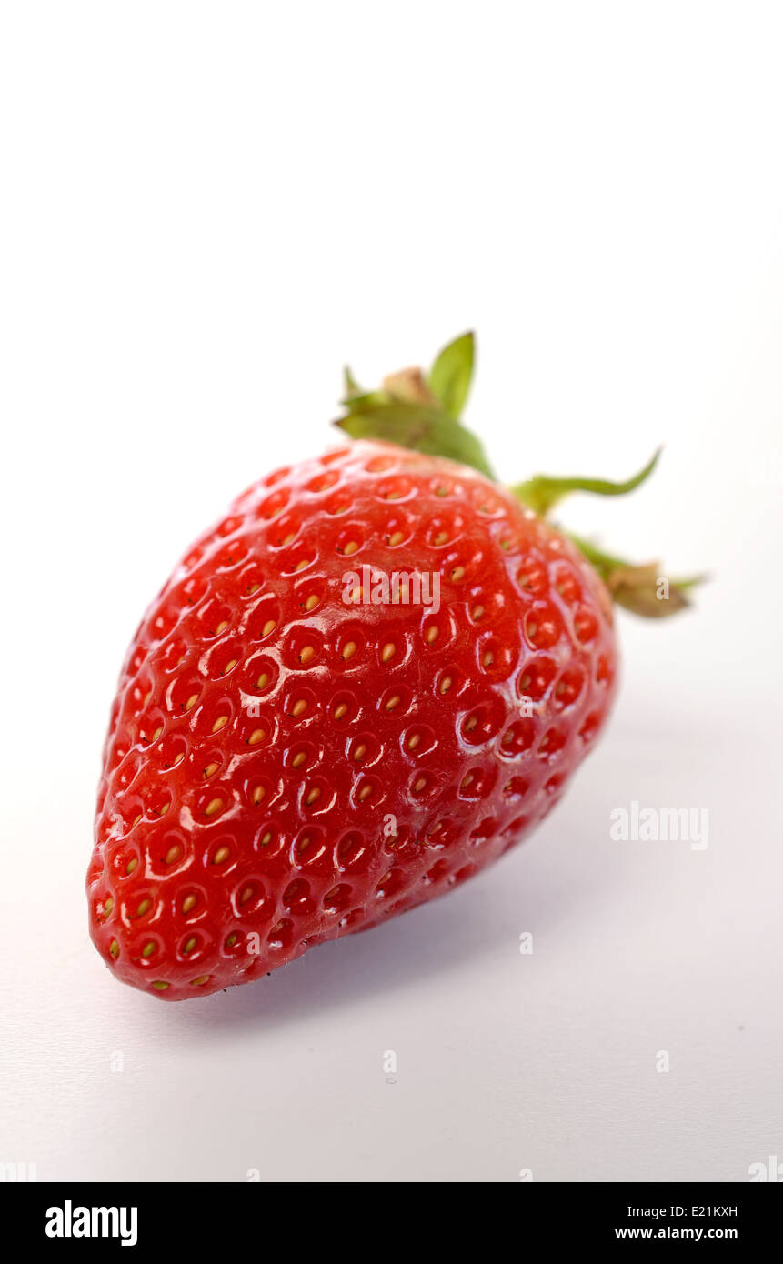 Fresh red strawberry on a white table Stock Photo - Alamy