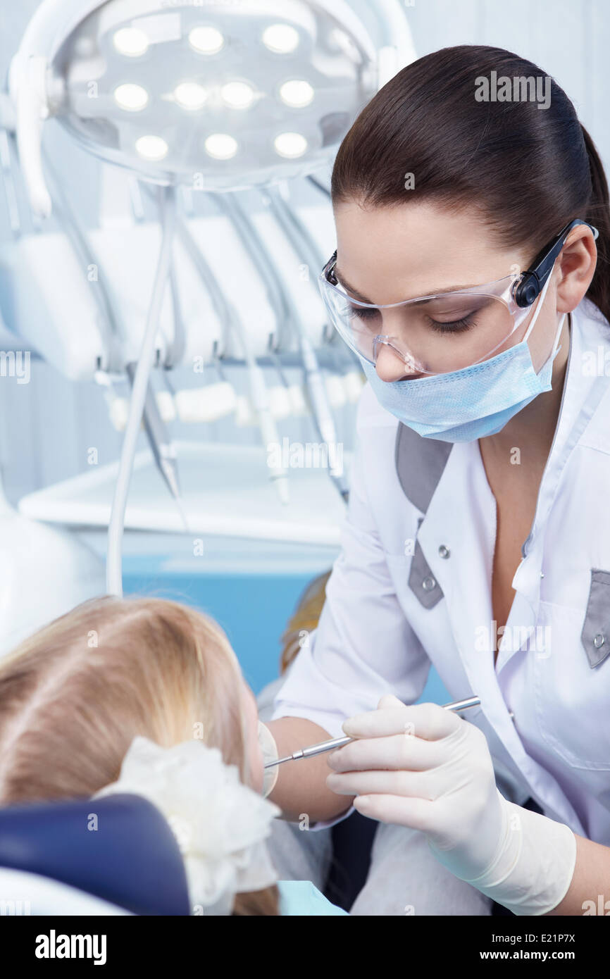 Child treated teeth in the dental clinic Stock Photo