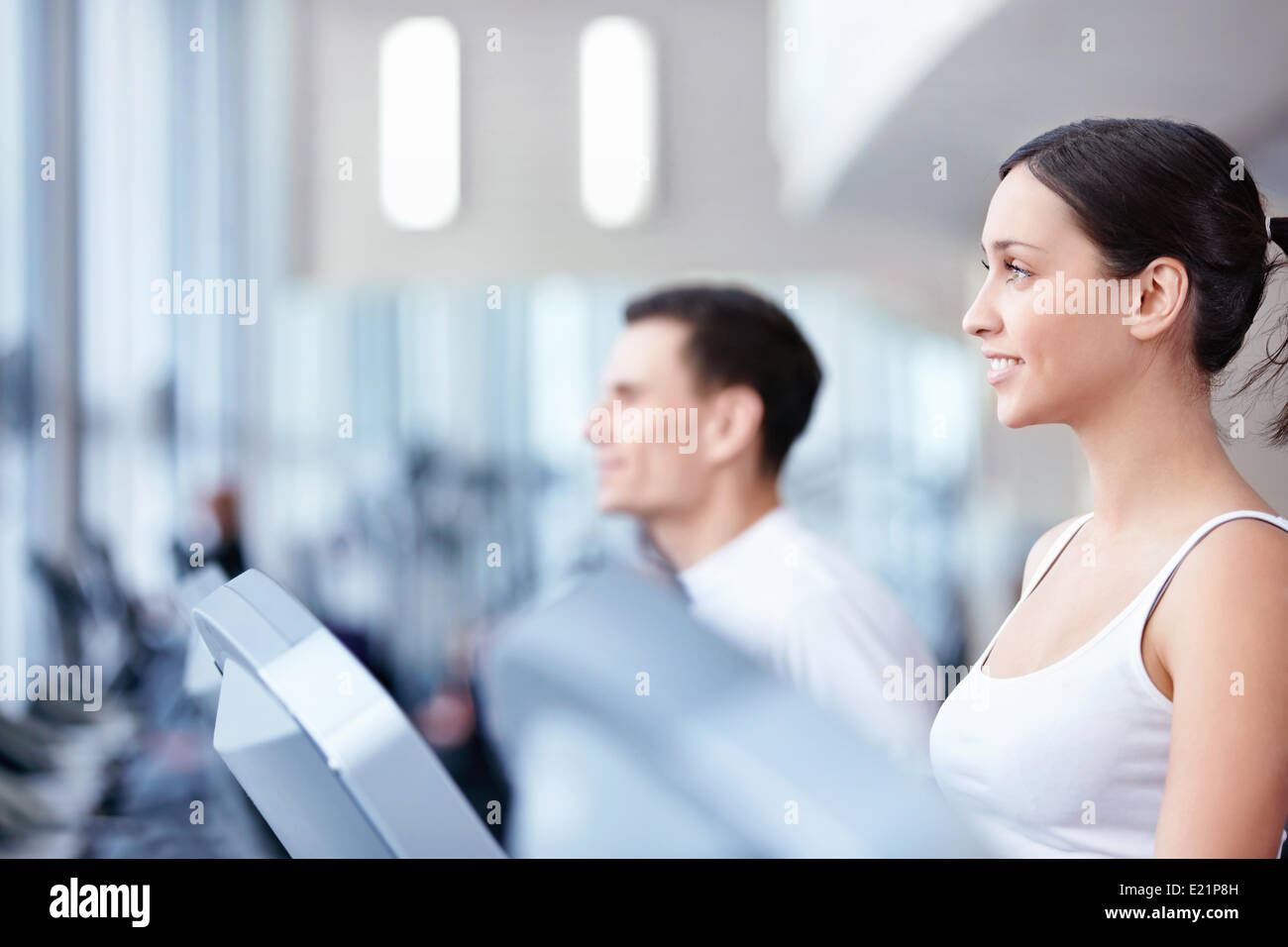 Attractive young people engaged in fitness Stock Photo