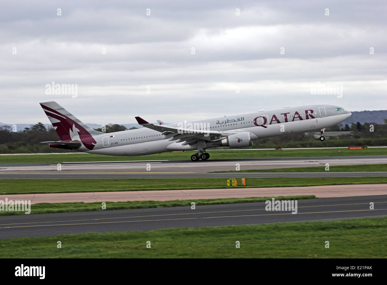 Qatar Airways Airbus A330-302, A7-AEE, taking off from Manchester Airport, England Stock Photo