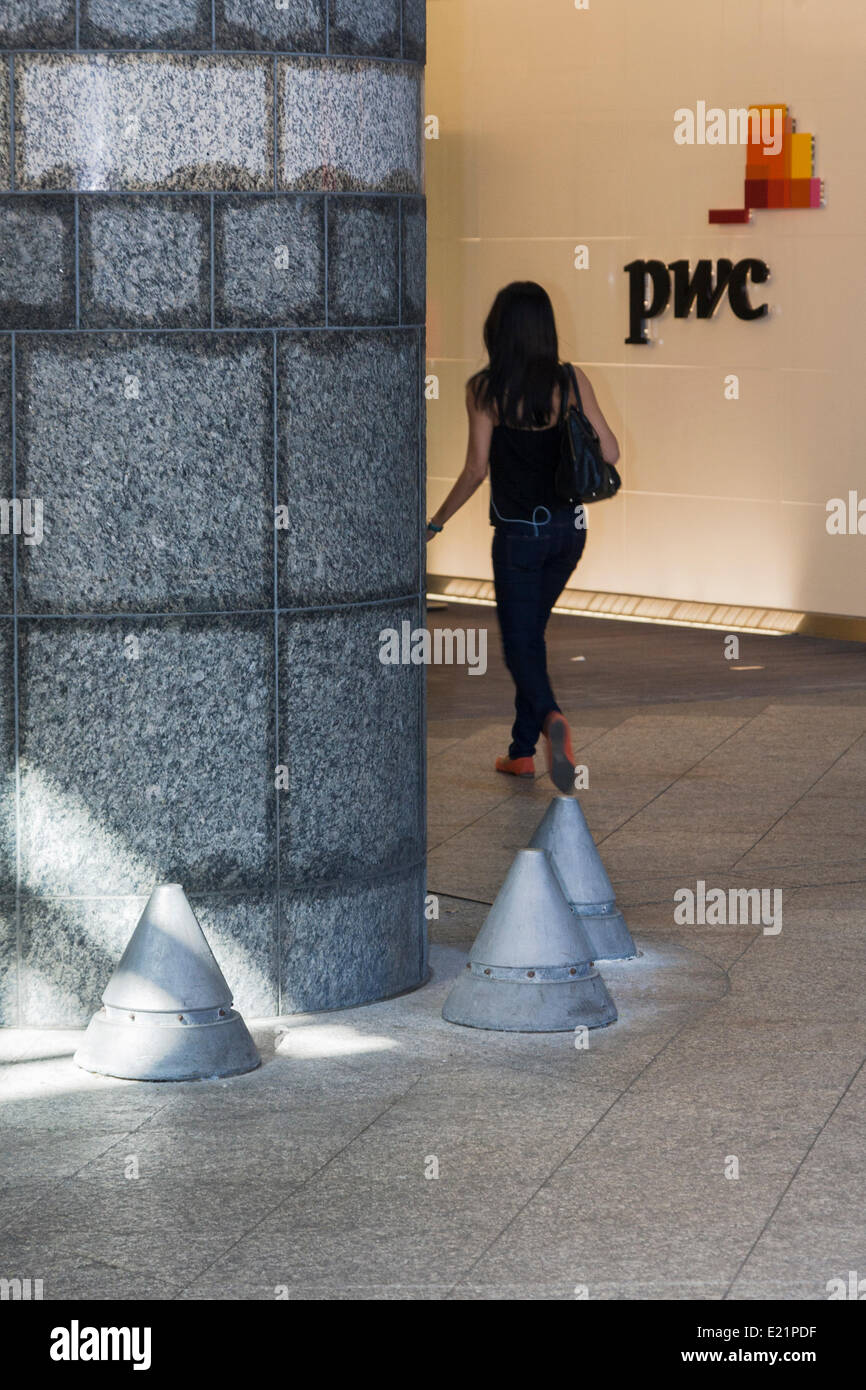 London, UK. 13th June, 2014. Pointed bollards outside top accountancy firm PriceWaterhouseCoopers Embankment Place offices in Charing Cross, appear to have been placed to deter homeless people from sleeping in the shelter provided by the building's entrance. Credit:  Paul Davey/Alamy Live News Stock Photo