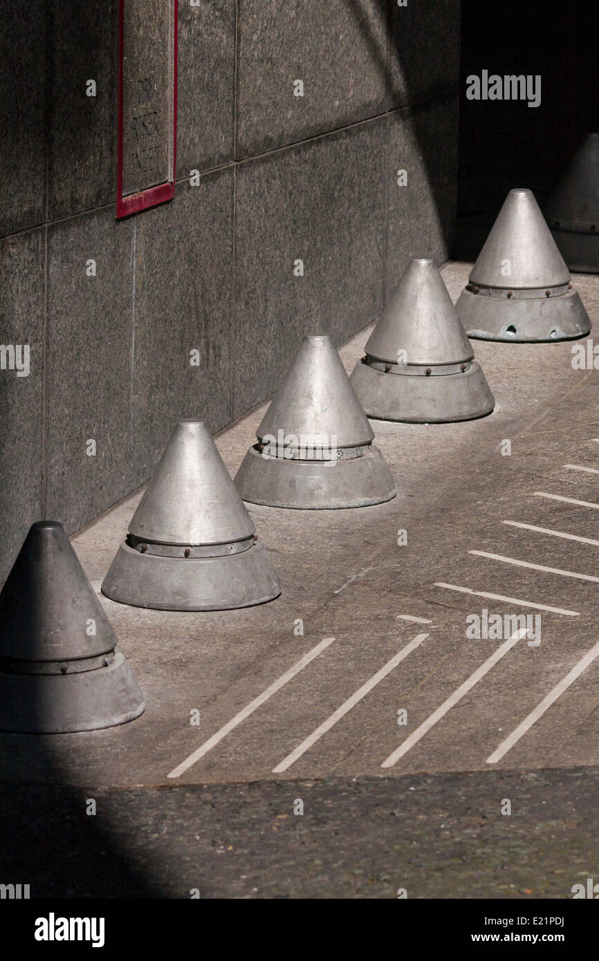 London, UK. 13th June, 2014. Pointed bollards outside top accountancy firm PriceWaterhouseCoopers Embankment Place offices in Charing Cross, appear to have been placed to deter homeless people from sleeping in the shelter provided by the building's entrance. Credit:  Paul Davey/Alamy Live News Stock Photo