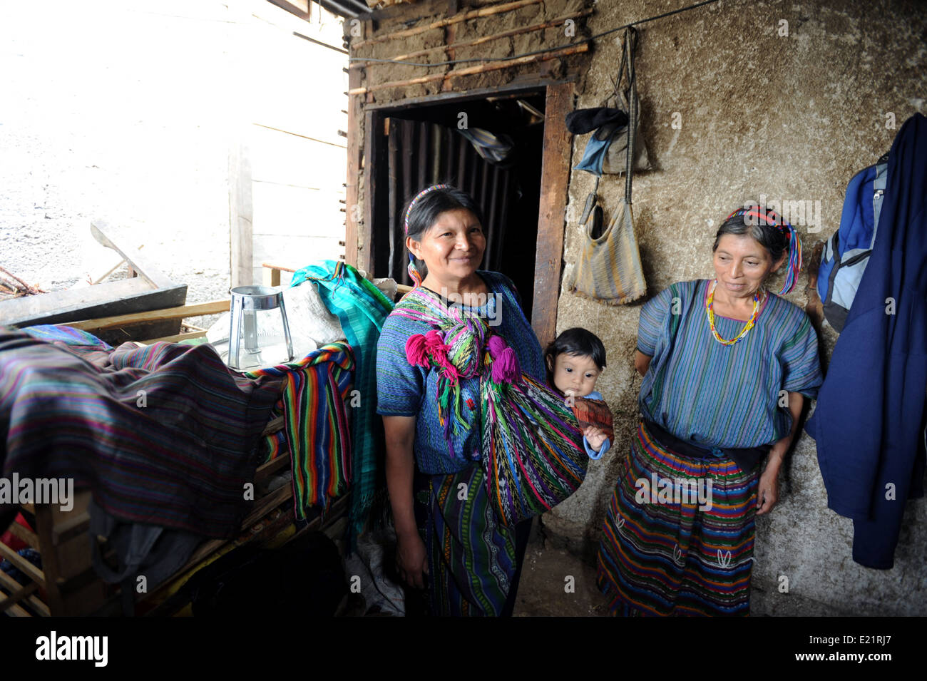 Maya Indigenous family at home in San Antonio Palopo, Solola, Guatemala. Stock Photo