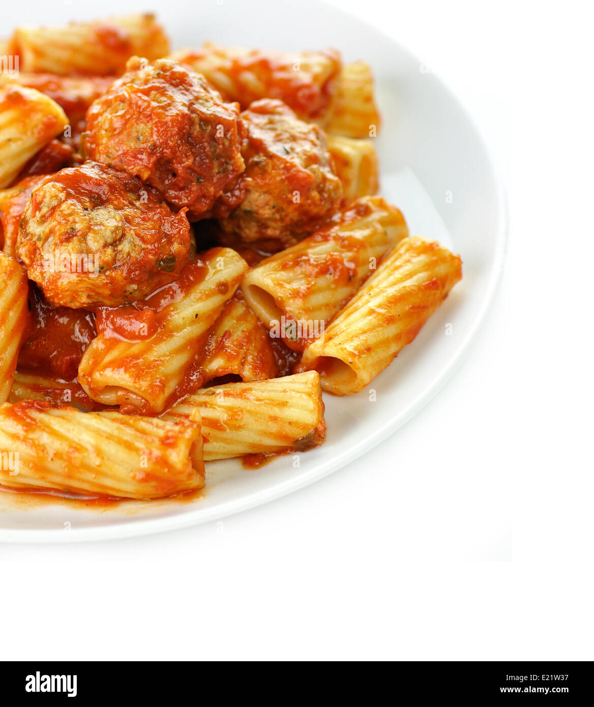 Rigatoni with tomato sauce and meatballs. Stock Photo