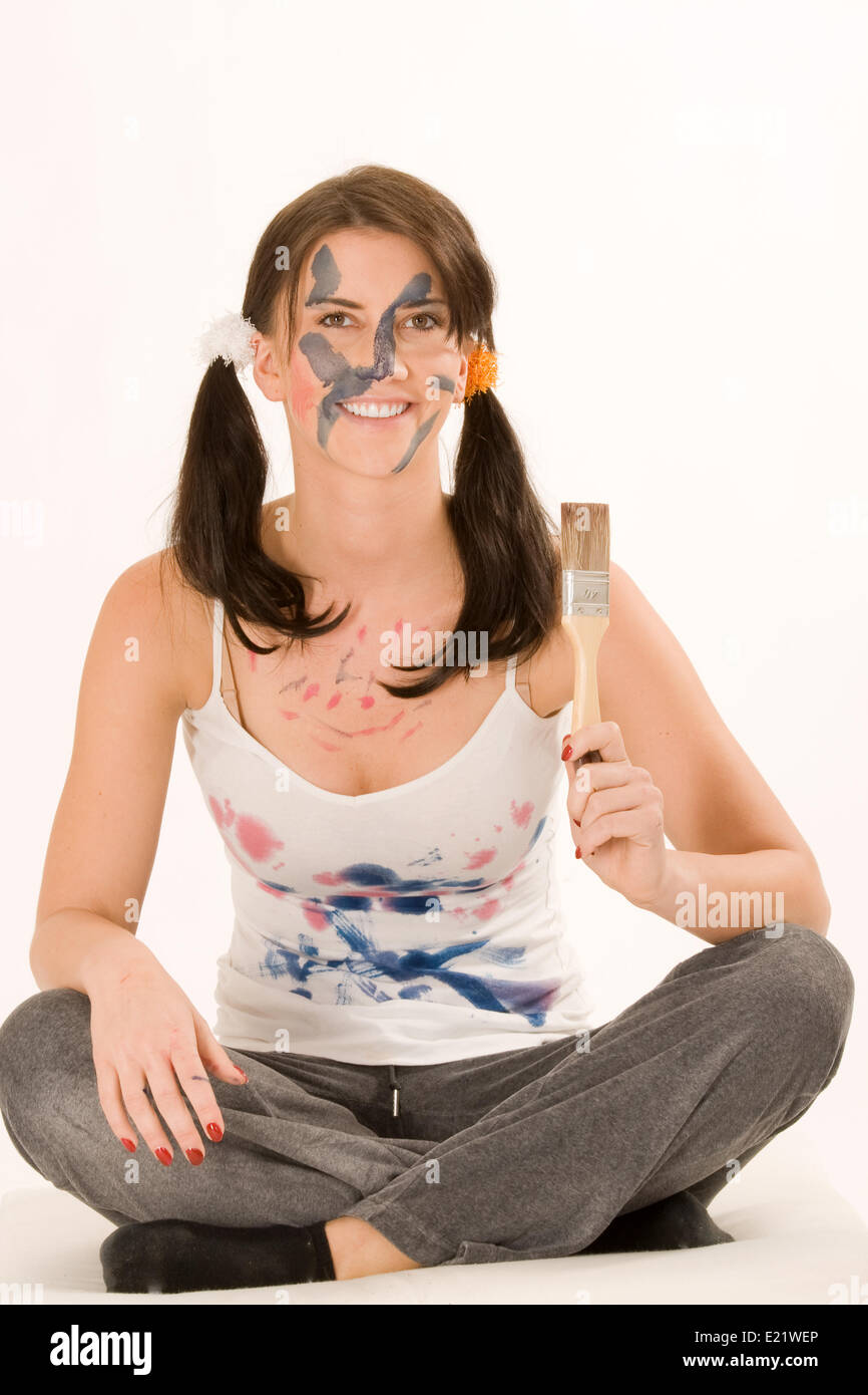 Young woman with paint on his face Stock Photo - Alamy
