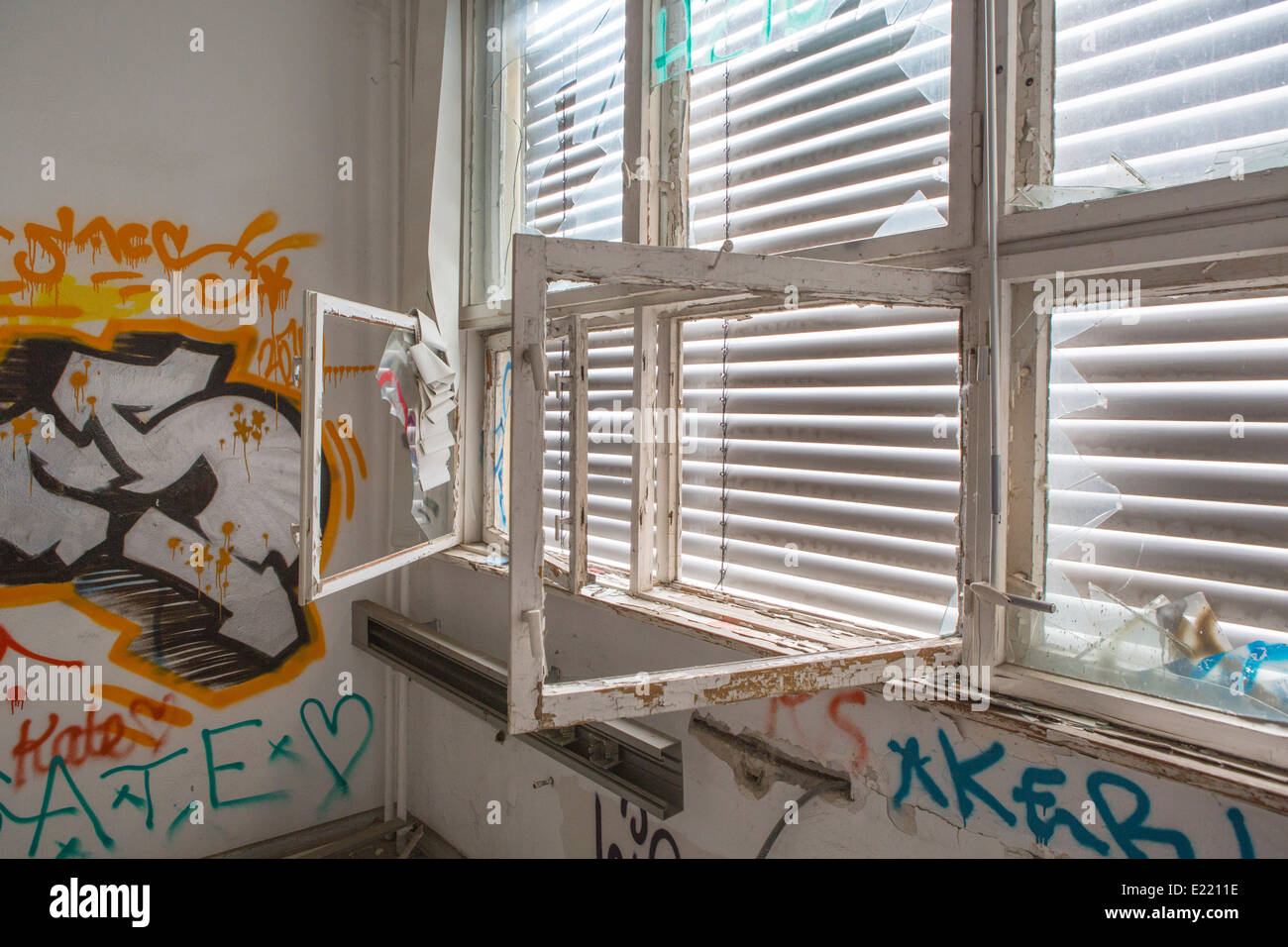 Abandoned flat building (GDR times) with graffiti sprayed, Berlin, Germany Stock Photo