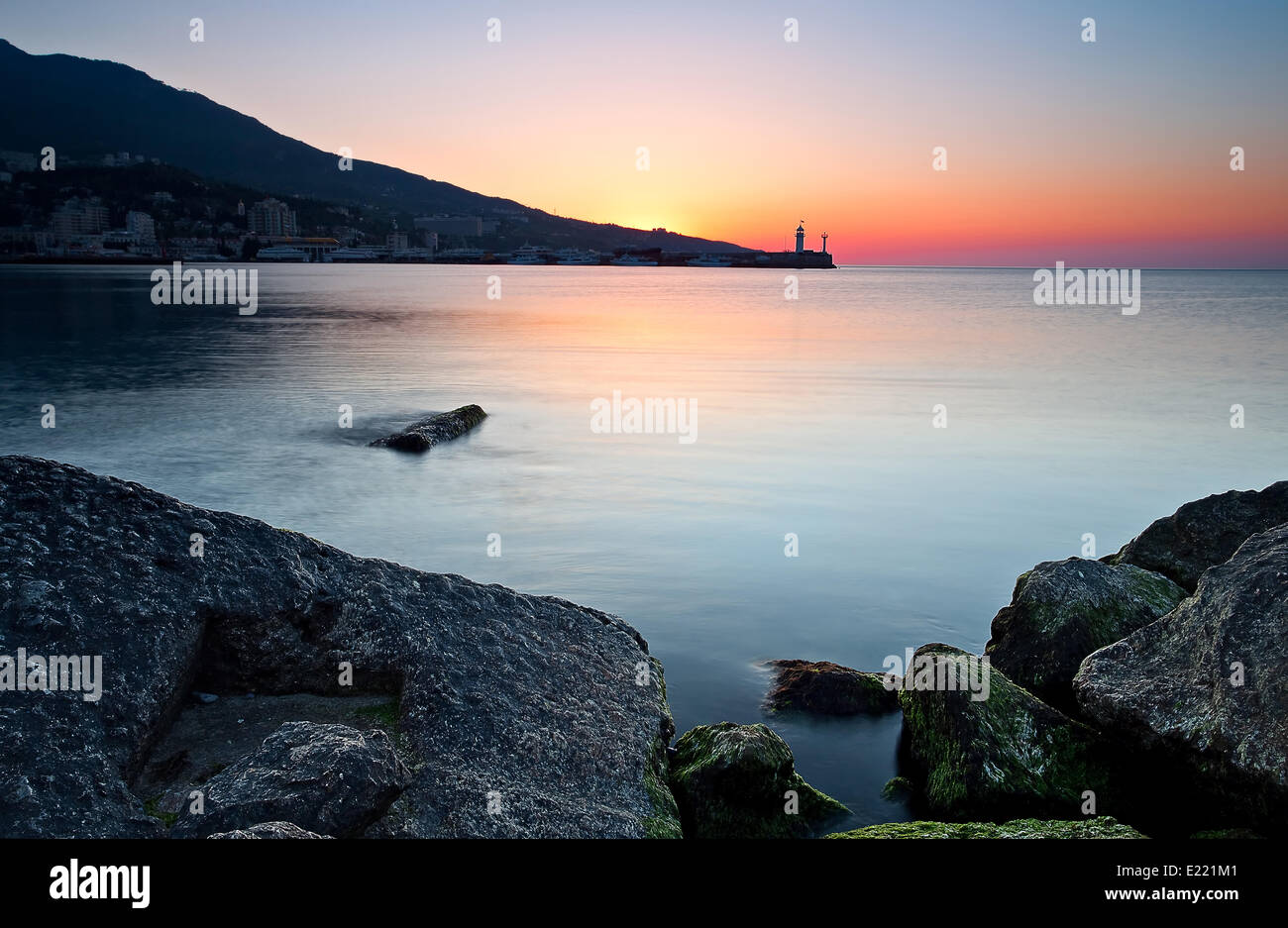 Sunrise on the rocky coastline Stock Photo - Alamy