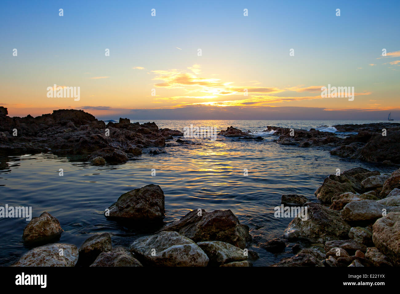 Sunset on rocky sea coast hi-res stock photography and images - Alamy