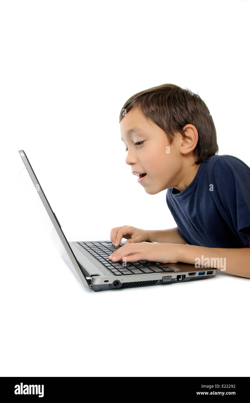 Boy with laptop isolated on white background Stock Photo - Alamy