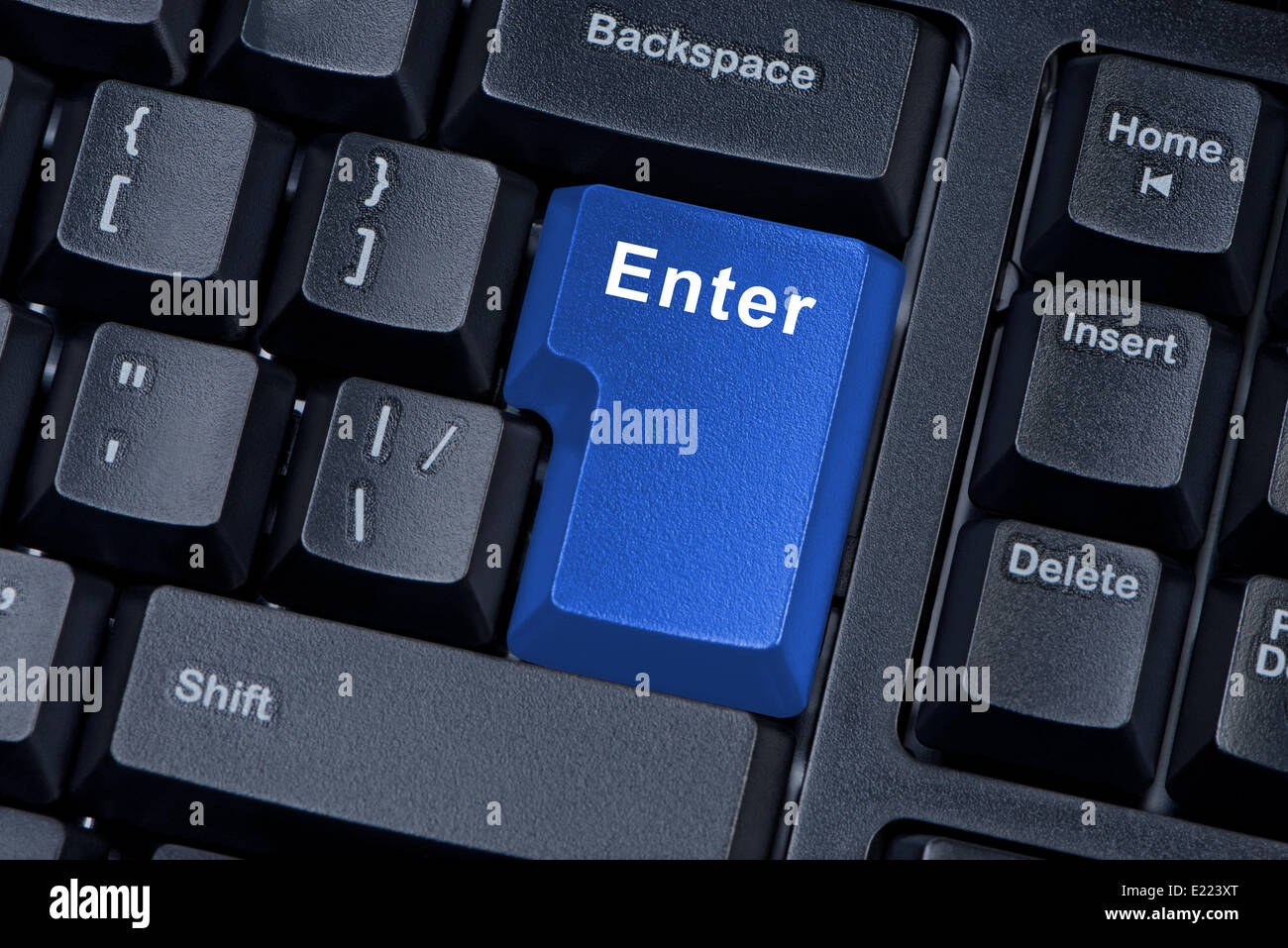 Blue button enter computer keyboard. Stock Photo
