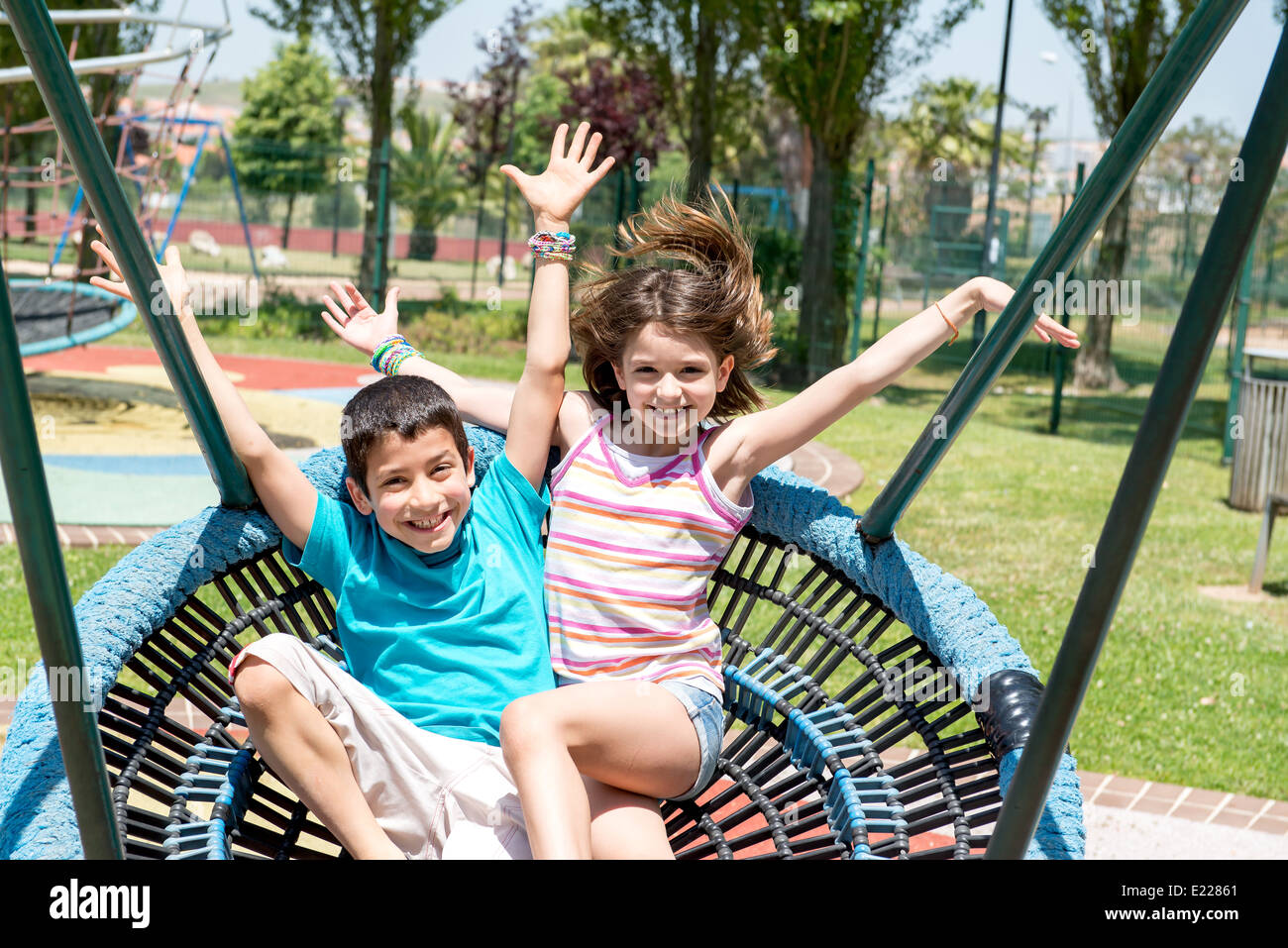 Young kids having fun in the park Stock Photo Alamy