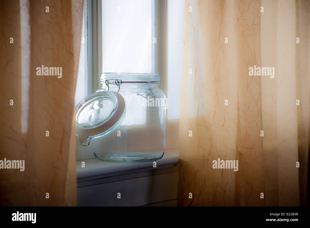 Mason Jar On Window Sill, Summer Day Light Stock Photo