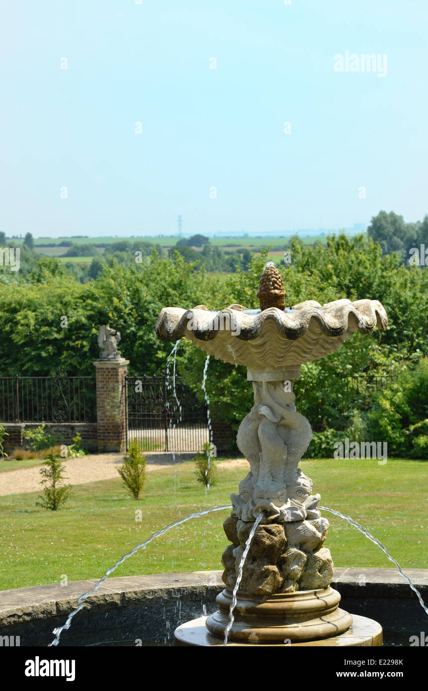 Fountain in english garden Stock Photo - Alamy