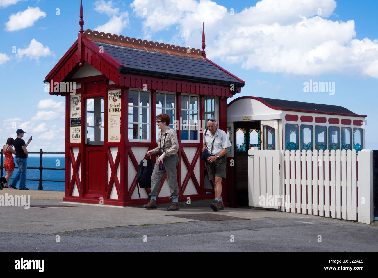 Passengers arriving from the beach at the Saltburn cliff lift top station Stock Photo