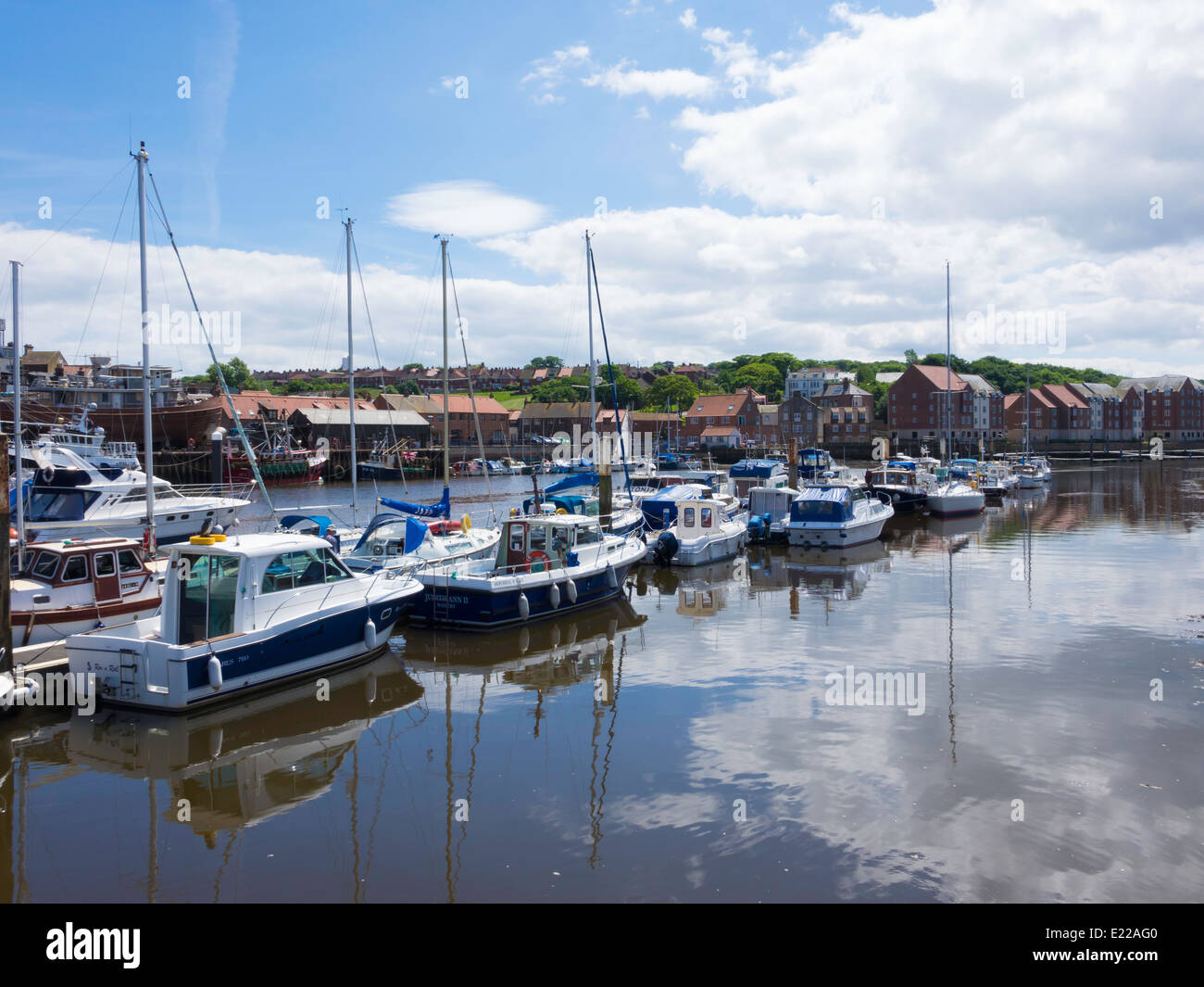 Whitby marina, in the river Esk with small pleasure craft in summer sunshine Stock Photo