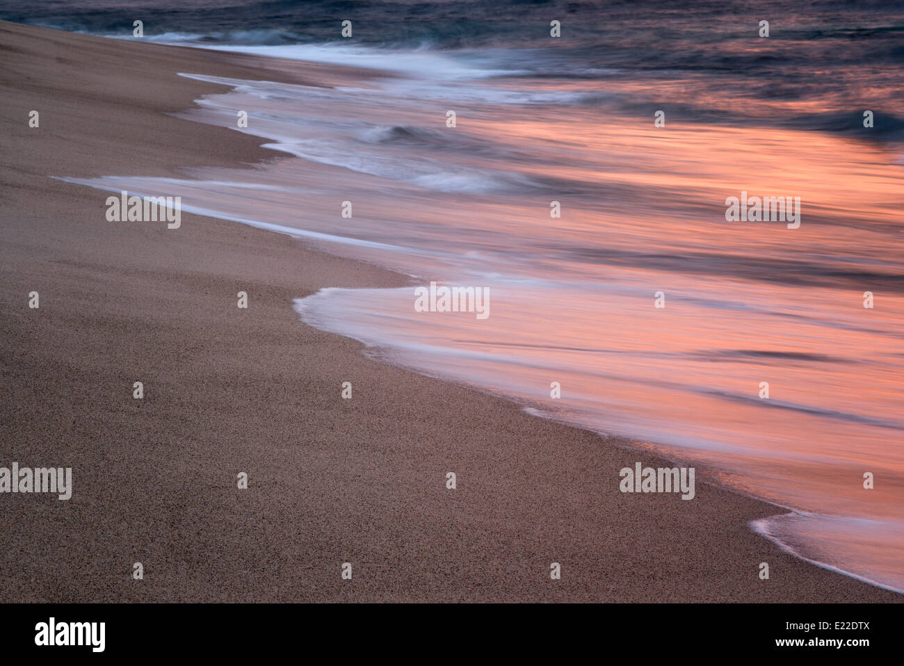 Ocean wave reflecting sunset. Punta Mita, Mexico Stock Photo