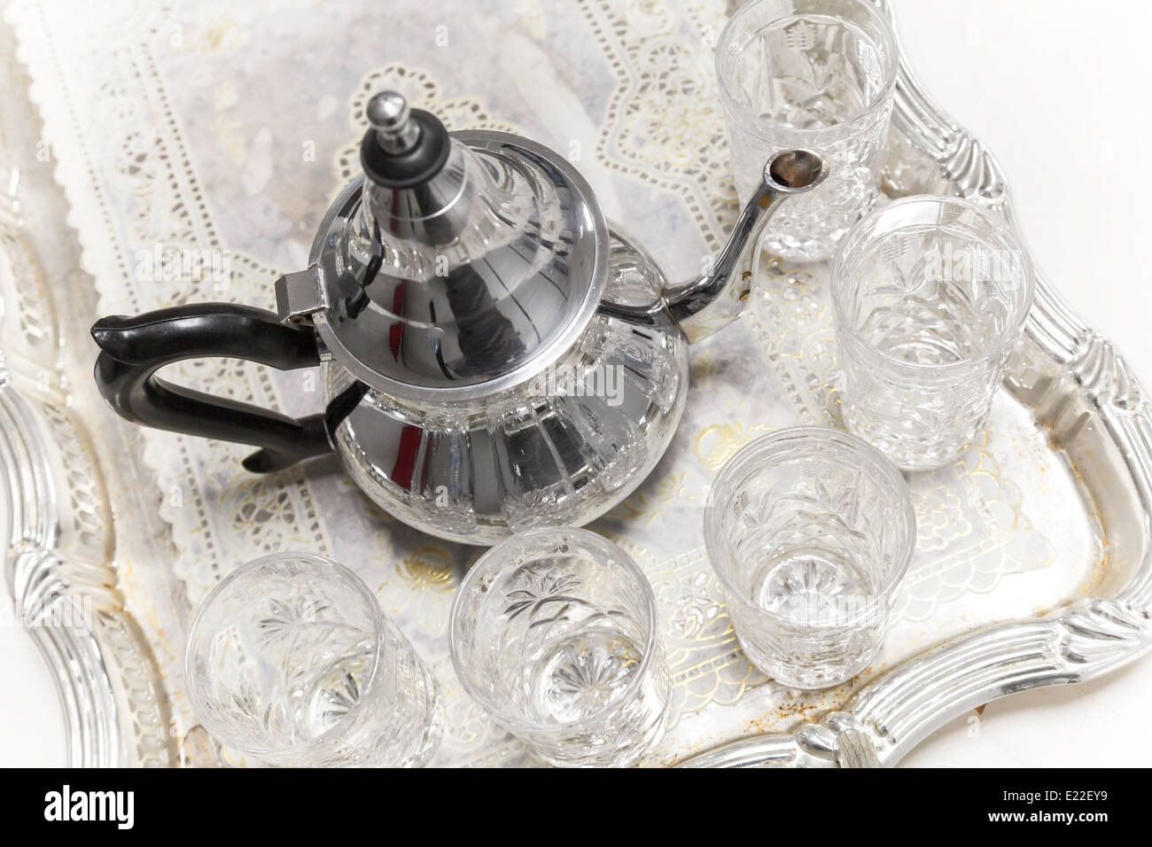 Moroccan tea theme. Metal Arabic teapot with glasses Stock Photo Alamy