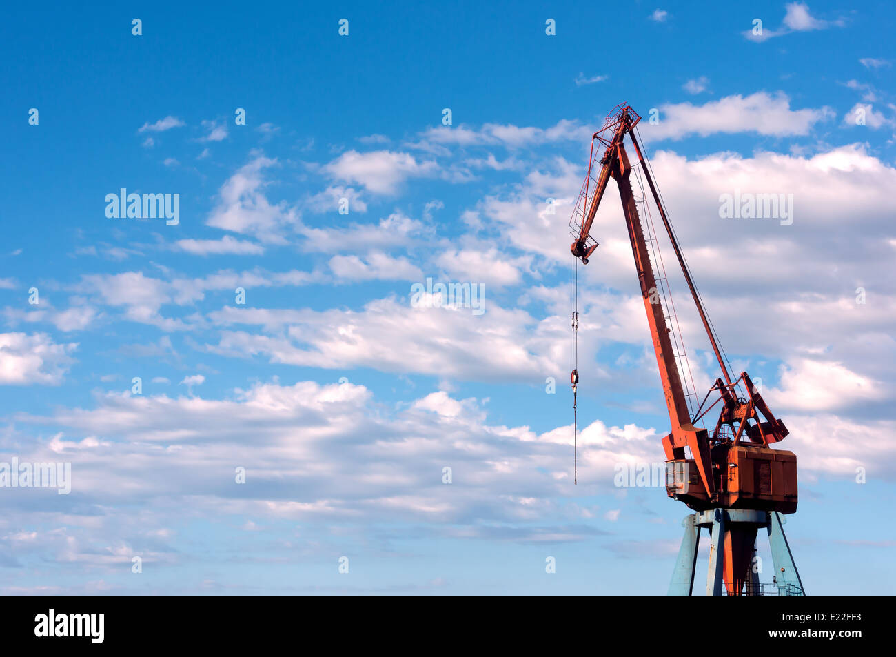 port crane against blue sky Stock Photo