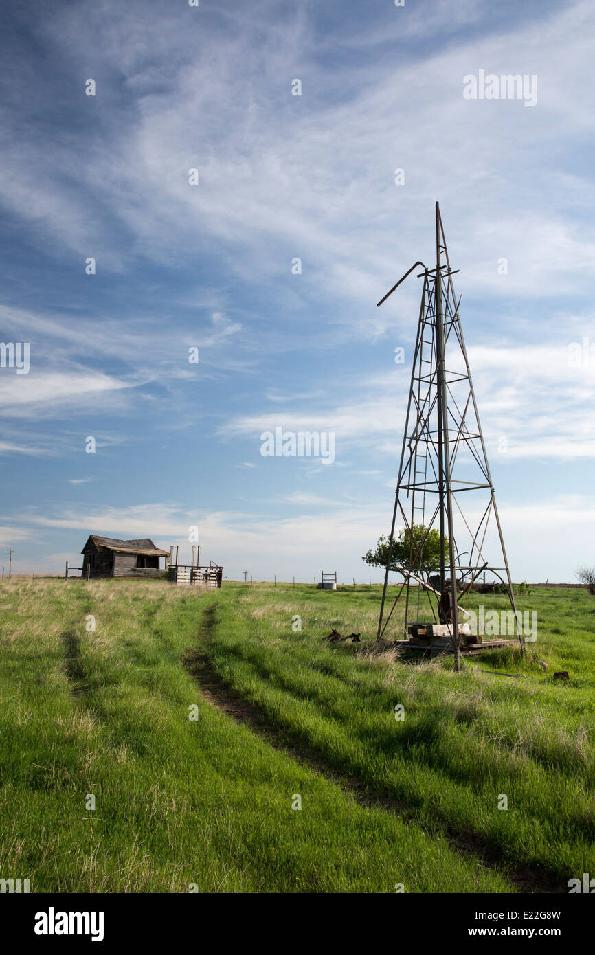 Watford City, North Dakota An old, abandoned farmhouse and windmill