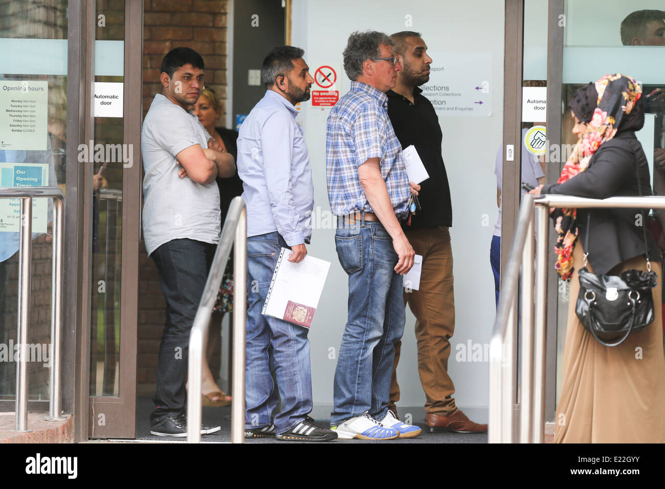PEOPLE QUEUING FOR PASSPORTS AT THE PETERBOROUGH OFFICE ON THURSDAY