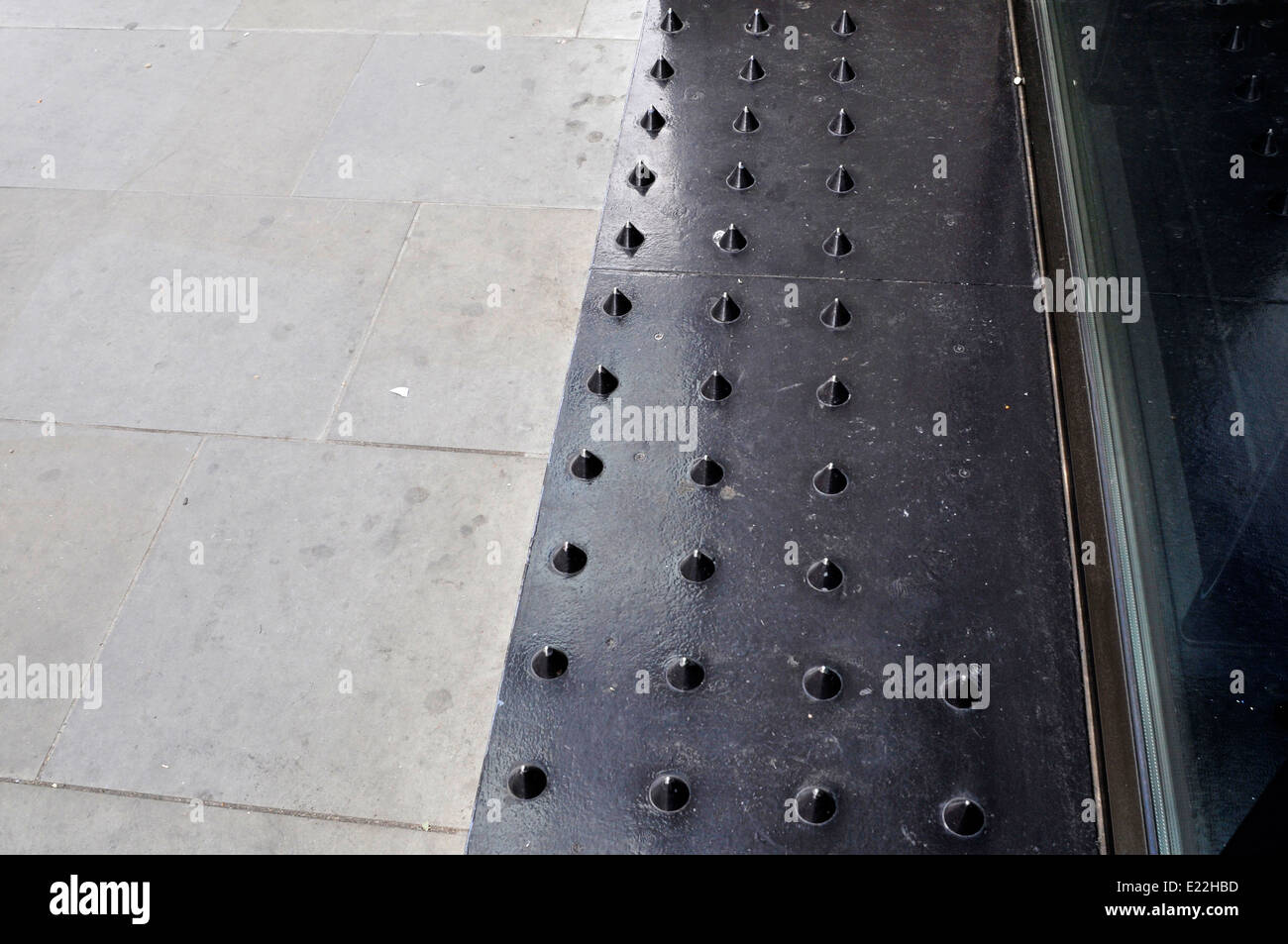 Spikes outside Tesco supermarket in central London Stock Photo