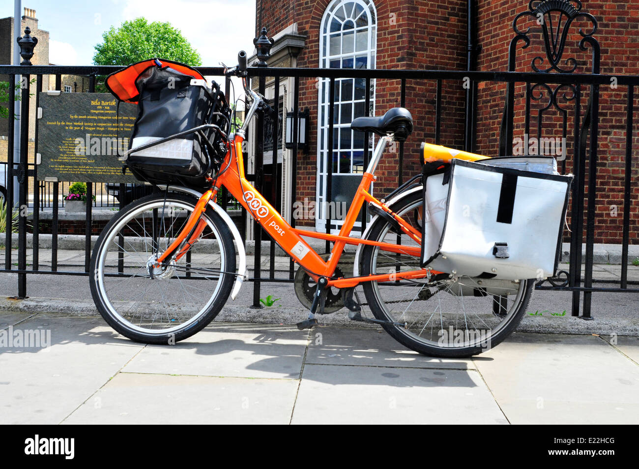 TNT post bicycle delivery in South Kensington, UK. Stock Photo