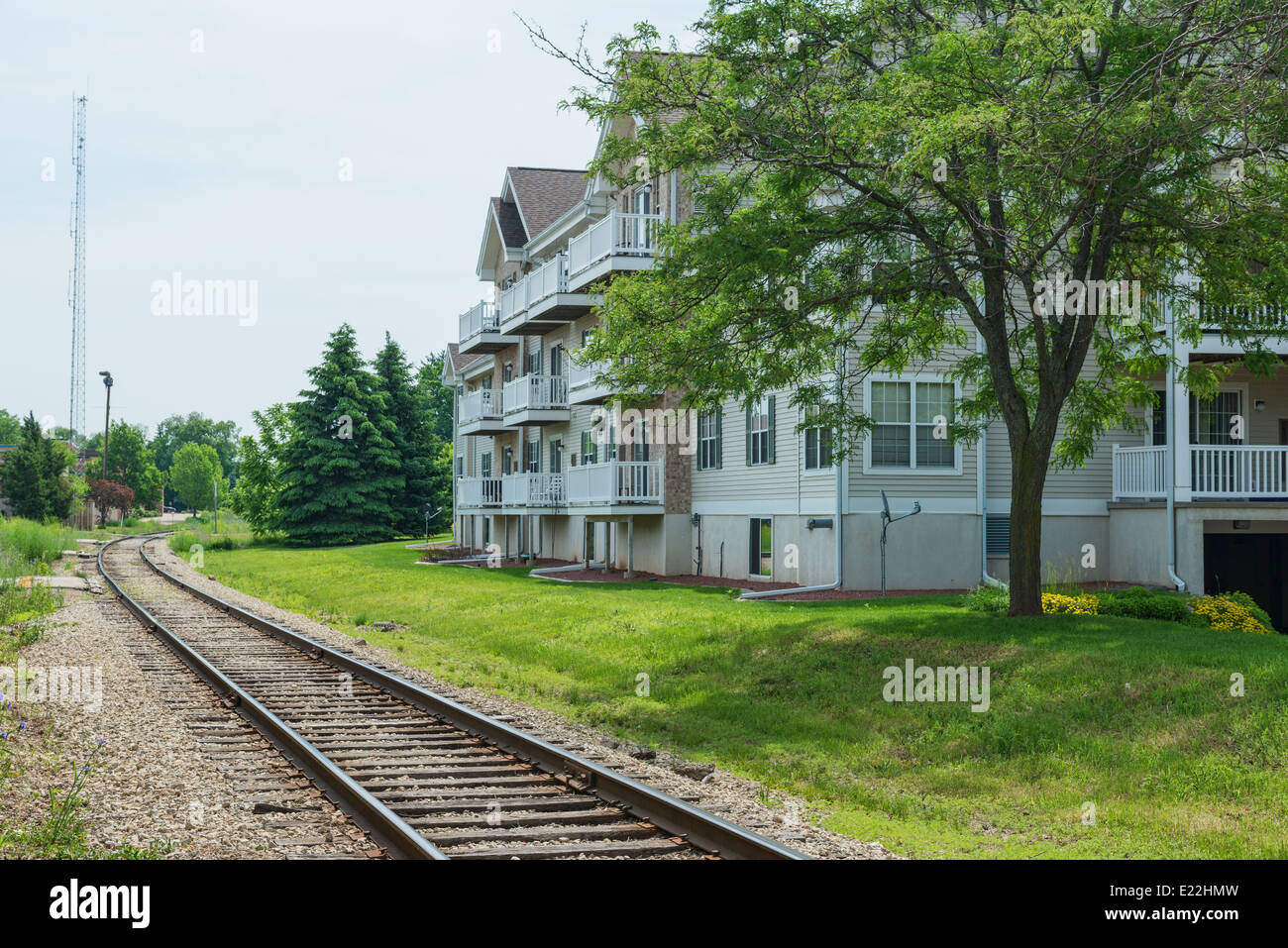 Railroad tracks alongside an apartment building, Middleton, Wisconsin